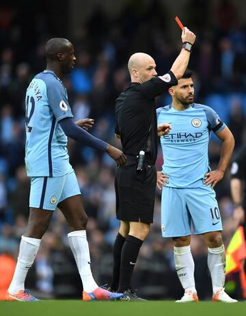 Sergio Aguero of Manchester City is shown a red card by referee Anthony Taylor.