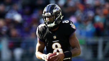 BALTIMORE, MARYLAND - DECEMBER 31: Quarterback Lamar Jackson #8 of the Baltimore Ravens runs with the ball against the Miami Dolphins at M&T Bank Stadium on December 31, 2023 in Baltimore, Maryland.   Rob Carr/Getty Images/AFP (Photo by Rob Carr / GETTY IMAGES NORTH AMERICA / Getty Images via AFP)