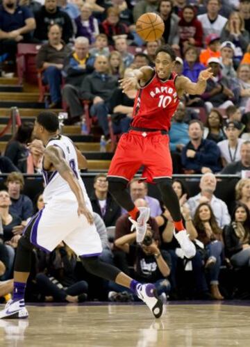 Nov 15, 2015; Sacramento, CA, USA; Toronto Raptors guard DeMar DeRozan (10) passes the ball against Sacramento Kings forward Rudy Gay (8) during the fourth quarter at Sleep Train Arena. The Sacramento Kings defeated the Toronto Raptors 107-101. Mandatory Credit: Kelley L Cox-USA TODAY Sports