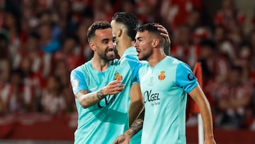 Dani Rodríguez y Sergi Darder, celebran un gol.