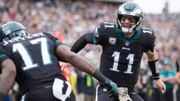 Nov 5, 2017; Philadelphia, PA, USA; Philadelphia Eagles quarterback Carson Wentz (11) reacts with wide receiver Alshon Jeffery (17) after his touchdown against the Denver Broncos during the first quarter at Lincoln Financial Field. Mandatory Credit: Bill Streicher-USA TODAY Sports