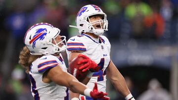 SEATTLE, WASHINGTON - OCTOBER 27: Joe Andreessen #44 and Mack Hollins #13 of the Buffalo Bills celebrate after recovering a muffed punt during the fourth quarter against the Seattle Seahawks at Lumen Field on October 27, 2024 in Seattle, Washington.
