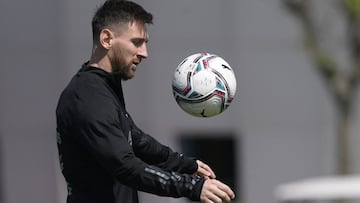 Argentina's forward Lionel Messi eyes the ball during a training session in Ezeiza, Buenos Aires on October 6, 2021, ahead of a FIFA World Cup Qatar 2022 qualifier footbal match against Paraguay to be held in Asuncion on October 7. (Photo by JUAN MAB