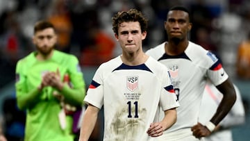 USA's midfielder #11 Brenden Aaronson reacts at the end of the Qatar 2022 World Cup round of 16 football match between the Netherlands and USA at Khalifa International Stadium in Doha on December 3, 2022. (Photo by Jewel SAMAD / AFP)