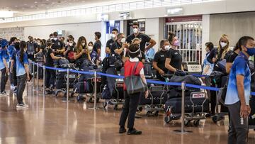 TOKYO, JAPAN - JULY 13: Members of Italy’s Olympic delegation arrive at Haneda airport on on July 13, 2021 in Tokyo, Japan. Following a surge in coronavirus infections in Tokyo, the government has placed the capital in its fourth state of emergency as large numbers of foreign visitors arrive for the Olympics. (Photo by Yuichi Yamazaki/Getty Images)