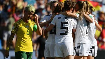 Germany's players celebrate their first goal during the France 2019 Women's World Cup Group B football match between South Africa and Germany, on June 17, 2019, at the Mosson Stadium in Montpellier, southern France. (Photo by Pascal GUYOT / AFP)