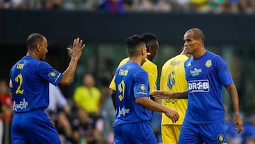 Jun 18, 2022; Miami, FL, USA; Rivaldo (right) celebrates with Radamel Falcao (middle) and Cafu (left) after scoring in the first half during The Beautiful Game exhibition match at DRV PNK Stadium. Mandatory Credit: Sam Navarro-USA TODAY Sports