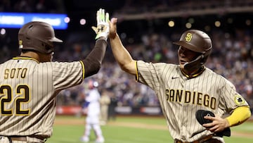 NEW YORK, NEW YORK - OCTOBER 09: Ha-Seong Kim #7 of the San Diego Padres celebrate with teammate Juan Soto #22 after scoring on a two RBI single hit by Austin Nola #26 against the New York Mets during the second inning in game three of the National League Wild Card Series at Citi Field on October 09, 2022 in the Flushing neighborhood of the Queens borough of New York City. (Photo by Dustin Satloff/Getty Images)