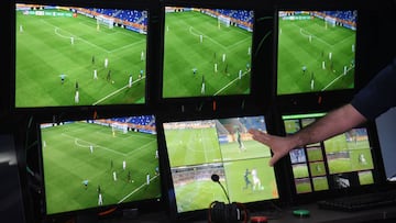 View of screens at the Video Operator Room (VOR) of the Conmebol headquarters in Luque, Paraguay, on September 25, 2019. - The use of VAR in football matches in South America "is here to stay", said Wednesday the president of Conmebol's Ref
