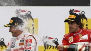 <b>PODIO 2011. </b>Button se llevó la victoria con el McLaren, Vettel fue segundo con su Red Bull y Alonso, tercero con el Ferrari.