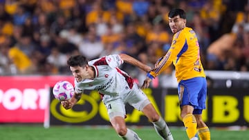 Unai Bilbao (L) of Tijuana fights fo rthe ball with Ange Correa (R) of Tigres during the 15th round match between Tigres UANL and Tijuana as part of the Liga BBVA MX, Torneo Apertura 2025 at Universitario, on October 25, 2025 in Monterrey, Nuevo Leon, Mexico.