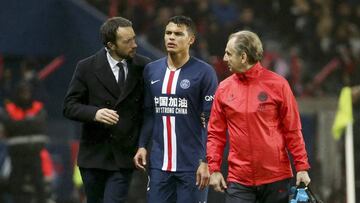Injured, Thiago Silva of PSG leaves the pitch with Doctor of PSG Laurent Aumont (left) during the French championship Ligue 1 football match between Paris Saint-Germain and Girondins de Bordeaux on February 23, 2020 at Parc des Princes stadium in Paris, F