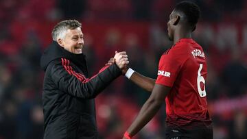 Ole Gunnar Solskjaer and Paul Pogba. 