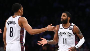 NEW YORK, NEW YORK - JANUARY 12: Kyrie Irving #11 of the Brooklyn Nets celebrates with Spencer Dinwiddie #8 against the Atlanta Hawks at Barclays Center on January 12, 2020 in New York City. Brooklyn Nets defeated the Atlanta Hawks 108-86.NOTE TO USER: User expressly acknowledges and agrees that, by downloading and or using this photograph, User is consenting to the terms and conditions of the Getty Images License Agreement. Mandatory Copyright Notice: Copyright 2020 NBAE.   Mike Stobe/Getty Images/AFP
 == FOR NEWSPAPERS, INTERNET, TELCOS &amp; TELEVISION USE ONLY ==