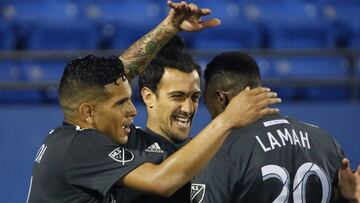 FC Dallas forward Maximiliano Urruti (37) is congratulated by midfielder Victor Ulloa, left, and forward Roland Lamah (20) after Urruti scored against the Philadelphia Union during the second half of an MLS soccer match Saturday night, April 21, 2018, in