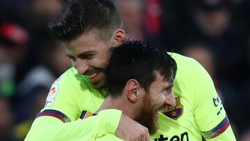 Messi, con Piqué.