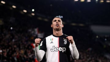 Juventus' Portuguese forward Cristiano Ronaldo celebrates after opening the scoring during the Italian Cup (Coppa Italia) round of 8 football match Juventus vs AS Roma on January 22, 2020 at the Juventus stadium in Turin. (Photo by Marco BERTORELLO / AFP)