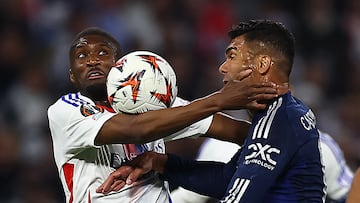 Soccer Football - Europa League - Quarter Final - First Leg - Olympique Lyonnais v Manchester United - Groupama Stadium, Lyon, France - April 10, 2025 Olympique Lyonnais' Clinton Mata in action with Manchester United's Casemiro REUTERS/Gonzalo Fuentes