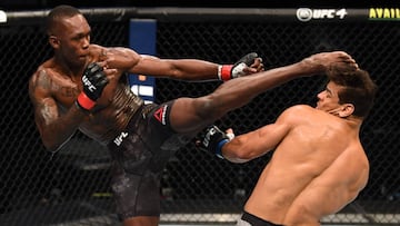 Israel Adesanya golpea a Paulo Costa en el UFC 253.