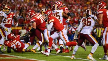 KANSAS CITY, MO - OCTOBER 2: Quarterback Alex Smith #11 of the Kansas City Chiefs rushes in to the end zone for a touchdown in the third quarter against the Washington Redskins at Arrowhead Stadium on October 2, 2017 in Kansas City, Missouri. Peter Aiken/Getty Images/AFP
== FOR NEWSPAPERS, INTERNET, TELCOS & TELEVISION USE ONLY ==