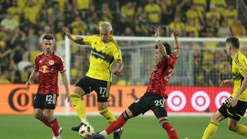 Oct 29, 2024; Columbus, Ohio, USA; Columbus Crew forward Christian Ramirez (17) and New York Red Bulls midfielder Felipe Carballo (20) battle for the ball in the first half in a 2024 MLS Cup Playoffs Round One match at Lower.com Field. Mandatory Credit: Trevor Ruszkowski-Imagn Images