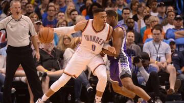 Mar 18, 2017; Oklahoma City, OK, USA; Oklahoma City Thunder guard Russell Westbrook (0) posts up against Sacramento Kings guard Darren Collison (7) during the third quarter at Chesapeake Energy Arena. Mandatory Credit: Mark D. Smith-USA TODAY Sports