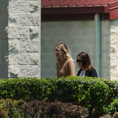 Who is Elizabeth Holmes and what was she found guilty of? What is Theranos?