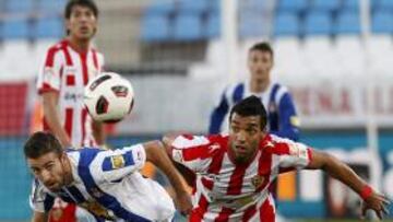 <b>VIBRANTE. </b>Luis García y el brasileño Michel pugnan por un balón en un partido que tuvo mucha intensidad.