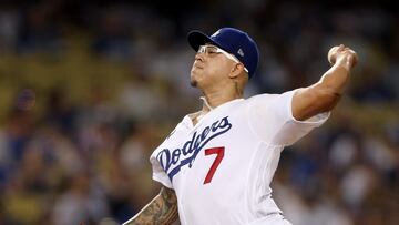 LOS ANGELES, CALIFORNIA - OCTOBER 04: Julio Urias #7 of the Los Angeles Dodgers pitches against the Colorado Rockies during the first inning at Dodger Stadium on October 04, 2022 in Los Angeles, California.   Harry How/Getty Images/AFP