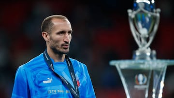 LONDON, ENGLAND - JUNE 01:  Giorgio Chiellini of Italy walks past the trophy wearing his losers medal during the Finalissima 2022 match between Italy and Argentina at Wembley Stadium on June 1, 2022 in London, England. (Photo by Marc Atkins/Getty Images)