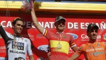 <b>PODIO 2011. </b>Rojas, en el centro, ganó el Nacional de fondo. Contador fue segundo y Koldo, tercero.