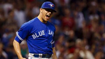 Aug 20, 2016; Cleveland, OH, USA; Toronto Blue Jays relief pitcher Roberto Osuna (54) celebrate after the game against the Cleveland Indians at Progressive Field. Toronto won 6-5. Mandatory Credit: Rick Osentoski-USA TODAY Sports