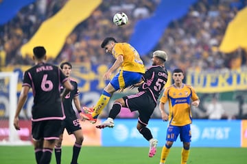 Aug 3, 2024; Houston, Texas, USA; Tigres UANL midfielder Fernando Gorriaran (8) and Inter Miami CF defender Marcelo Weigandt (57) attempt to head the ball during the first half in a MLS Leagues Cup soccer match at NRG Stadium. Mandatory Credit: Maria Lysaker-USA TODAY Sports