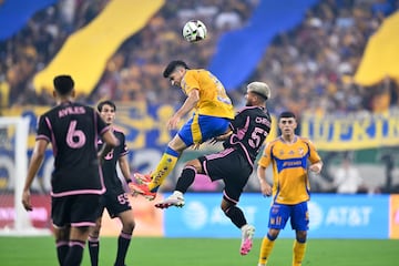 Tigres UANL midfielder Fernando Gorriarán (8) and Inter Miami CF defender Marcelo Weigandt (57) attempt to head the ball.