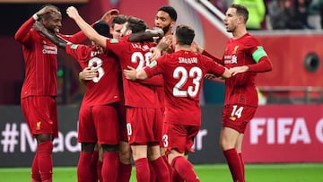 Liverpool&#039;s players celebrate their opening goal during the 2019 FIFA Club World Cup semi-final football match between Mexico&#039;s Monterrey and England&#039;s Liverpool at the Khalifa International Stadium in the Qatari capital Doha on December 18