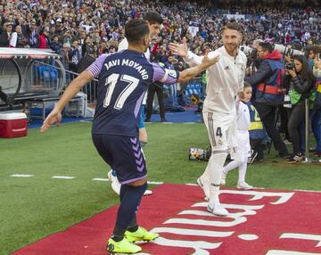 Javi Moyano and Sergio Ramos shake hands before the game.