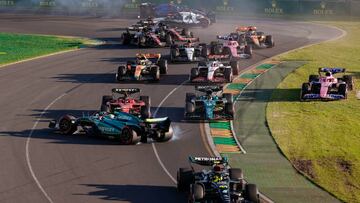 MELBOURNE, AUSTRALIA - APRIL 02: Second restart crash at turn 1 between Fernando Alonso of Spain and Aston Martin Aramco Cognizant F1 Team and Carlos Sainz Jr of Spain and Scuderia Ferrari during the F1 Grand Prix of Australia at Melbourne Grand Prix Circuit on April 2, 2023 in Melbourne, Australia. (Photo by Qian Jun/MB Media/Getty Images)