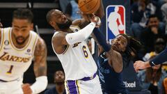 Apr 16, 2023; Memphis, Tennessee, USA; Los Angeles Lakers forward LeBron James (6) and Memphis Grizzlies guard Ja Morant (12) fight for control of the ball during the first half during game one of the 2023 NBA playoffs at FedExForum. Mandatory Credit: Petre Thomas-USA TODAY Sports