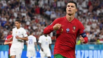 BUDAPEST, HUNGARY - JUNE 23: Cristiano Ronaldo of Portugal celebrates after scoring their side&#039;s first goal during the UEFA Euro 2020 Championship Group F match between Portugal and France at Puskas Arena on June 23, 2021 in Budapest, Hungary. (Photo