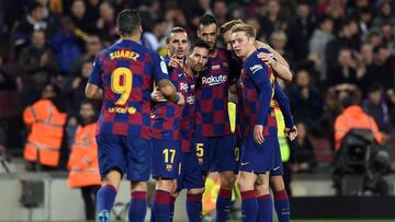 Barcelona&#039;s Argentine forward Lionel Messi (3L) and teammates celebrate their third goal during the Spanish League football match between FC Barcelona and RCD Mallorca at the Camp Nou stadium in Barcelona on December 7, 2019. (Photo by Josep LAGO / A