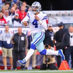 Dallas' QB is leading them to the playoffs; still, he needs better support from his coaches