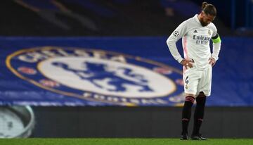 Real Madrid's Spanish defender Sergio Ramos reacts after conceding a second goal during the UEFA Champions League second leg semi-final football match between Chelsea and Real Madrid at Stamford Bridge in London on May 5, 2021. - Chelsea won the match 2-0