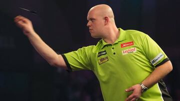 Netherlands&#039; Michael van Gerwen throws during the PDC World Championship darts final