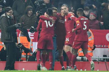 A Red Machine | Liverpool players celebrate.