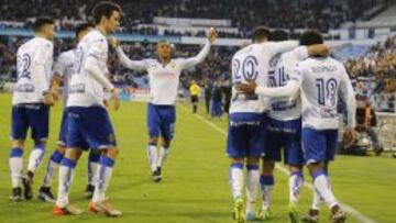 Los jugadores del Real Zaragoza celebran uno de los tres goles contra el Lugo el pasado domingo en La Romareda.