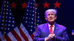 FILE PHOTO: Former U.S. President Donald Trump takes the stage to deliver remarks on education as he holds a campaign rally with supporters, in Davenport, Iowa, U.S. March 13, 2023. REUTERS/Jonathan Ernst/File Photo