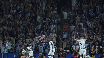Real Sociedad's French defender #24 Robin Le Normand celebrates with teammates after scoring his team's first goal during the Spanish Liga football match between Real Sociedad and Athletic Club Bilbao at the Anoeta stadium in San Sebastian on September 30, 2023. (Photo by CESAR MANSO / AFP)