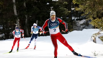 Norway's Vetle Sjaastad Christiansen (R), Norway's Sturla Holm Laegreid (L), and France's Emilien Jacquelin (C) ski during the men's biathlon 12,5km pursuit event during the Milano Cortina 2026 Winter Olympic Games at the Anterselva Biathlon Arena (Sudtirol Arena) in Anterselva (Val Pusteria) on February 15, 2026. (Photo by Odd ANDERSEN / AFP)