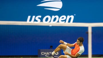 NEW YORK, USA, September 09:   Carlos Alcaraz of Spain collapses to the ground after his five-set victory against Frances Tiafoe of the United States in their Men's Singles Semi-Final match on Arthur Ashe Stadium during the US Open Tennis Championship 2022 at the USTA National Tennis Centre on September 9th 2022 in Flushing, Queens, New York City.  (Photo by Tim Clayton/Corbis via Getty Images)