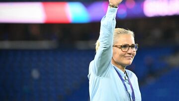 England's Dutch coach Sarina Wiegman punches the air after England won the UEFA Women's Euro 2025 final football match between England and Spain at the St. Jakob-Park Stadium in Basel, on July 27, 2025. England beat Spain 3-1 on penalties to win the Women's Euro 2025 final. (Photo by SEBASTIEN BOZON / AFP)